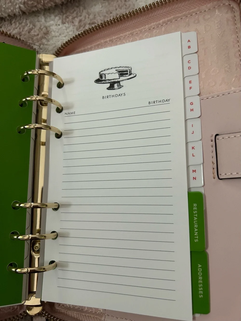 kate spade Wellesley Light Pink Zip personal size planner with Gold detail.